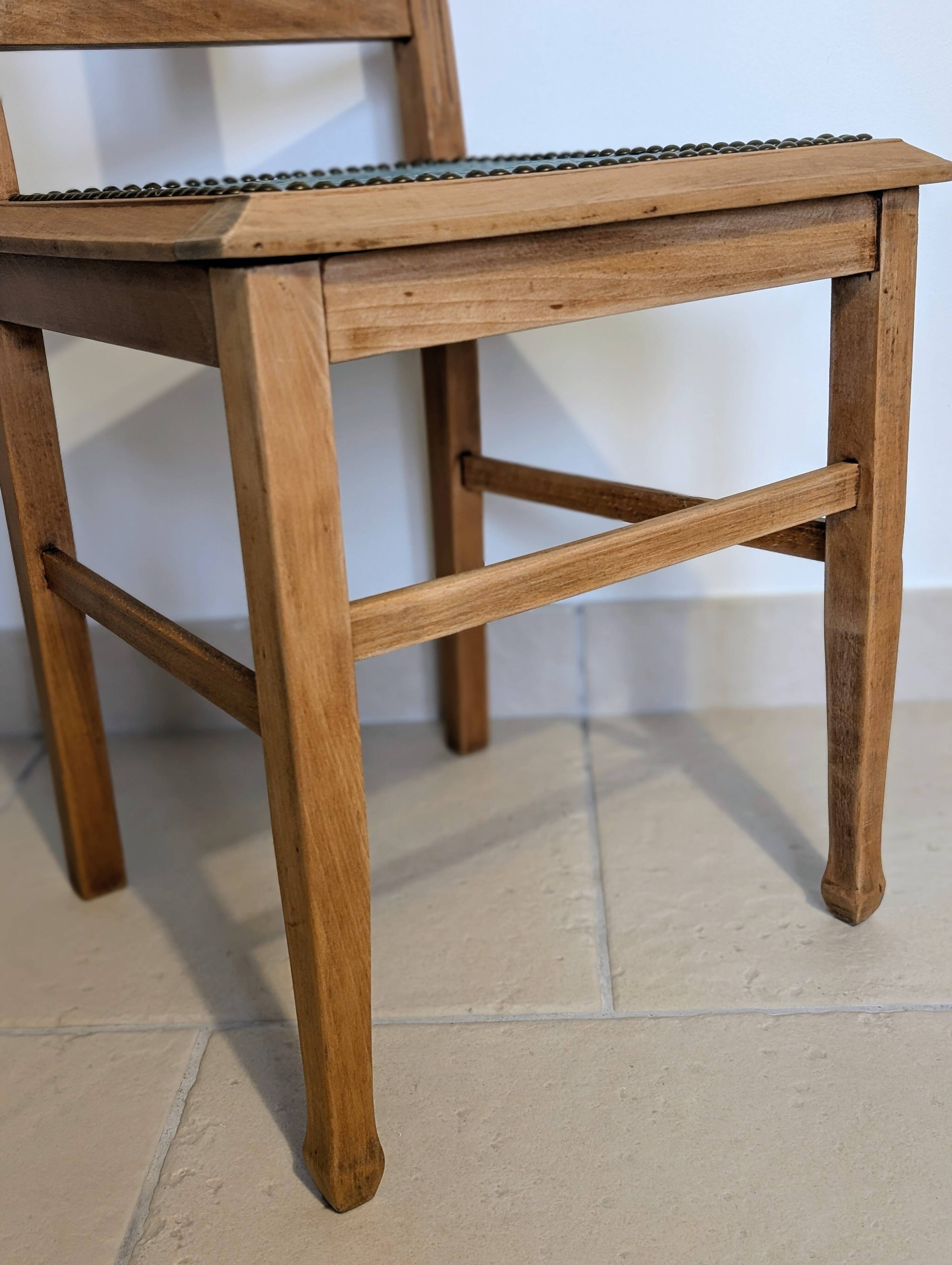 Revisited antique chair in solid wood with a sage green seat.