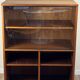 Teak bookshelf, sliding display + open storage, 60s/70s