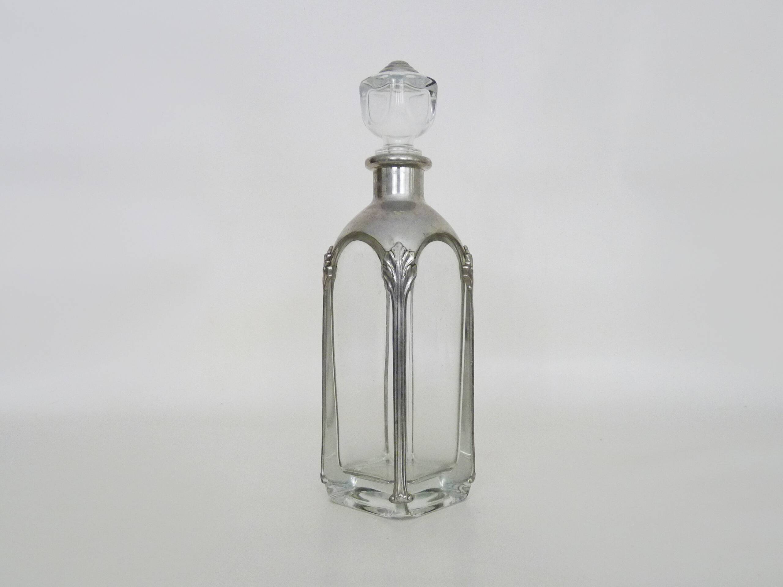 Magnificent crystal and silver-plated metal carafe bottle.