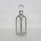 Magnificent crystal and silver-plated metal carafe bottle.