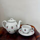 Magnificent teapot and fine porcelain cup set by Pillivuyt with cherries.