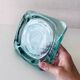 Glass tiled pocket emptier