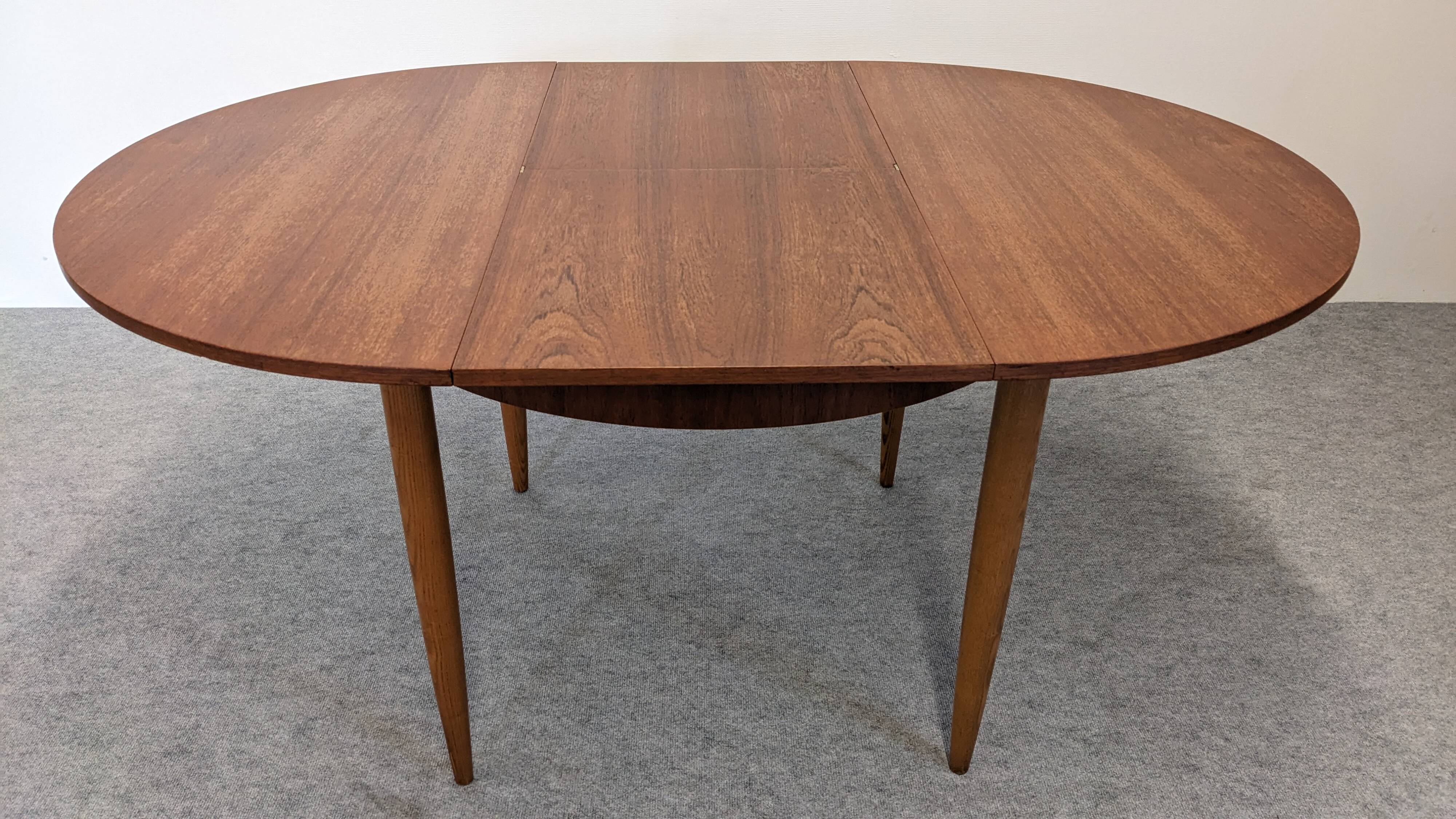 Extendable round table in Scandinavian style made of teak, France circa 1960.