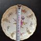 Small bowl / pierced plate in painted Nymphenburg porcelain.