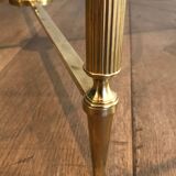 Round brass coffee table. Maison Baguès