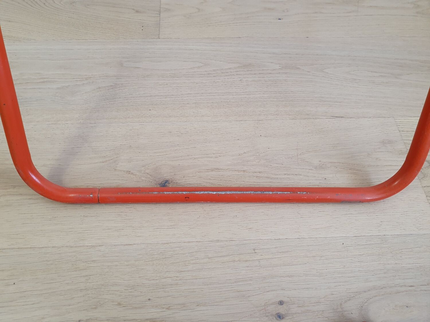 Perforated metal folding chair