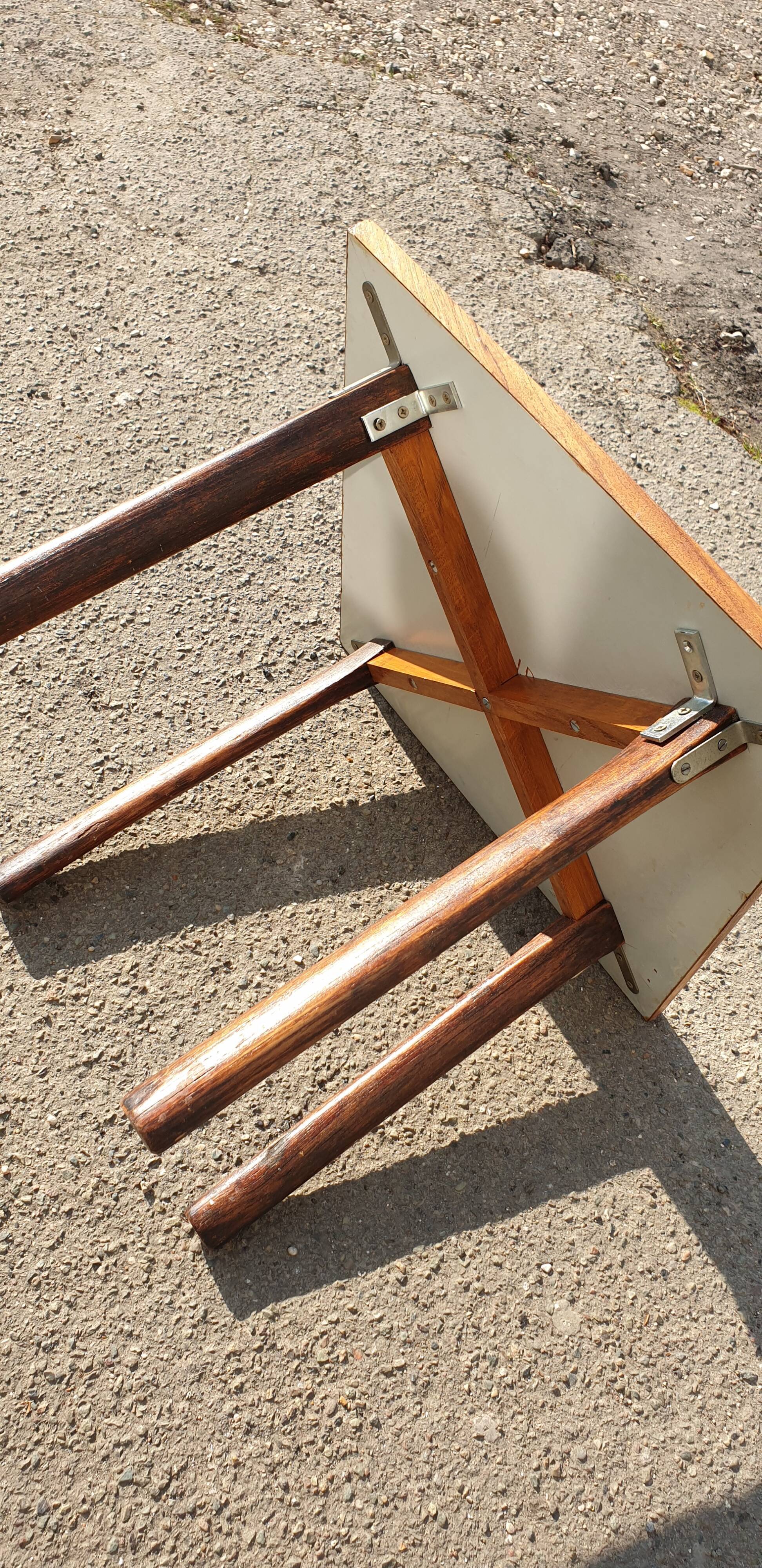 Wooden table with geometric decoration