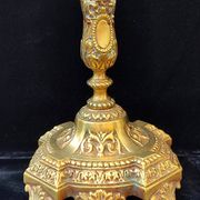 Pair of antique carved bronze candlesticks.