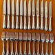 Christofle France, 12 dessert knives and 12 dessert forks in new condition.