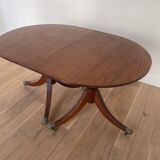 Antique table with wrought iron leg