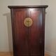 Brown lacquered Chinese wardrobe from Shandong.