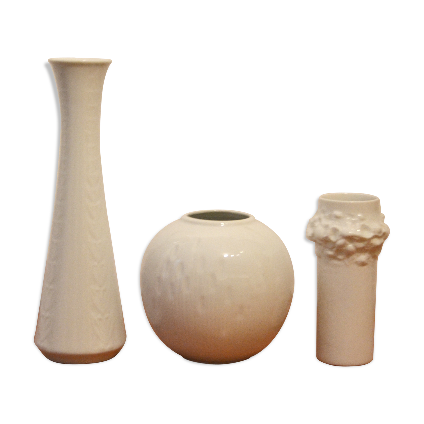 Trio of vases in white porcelain