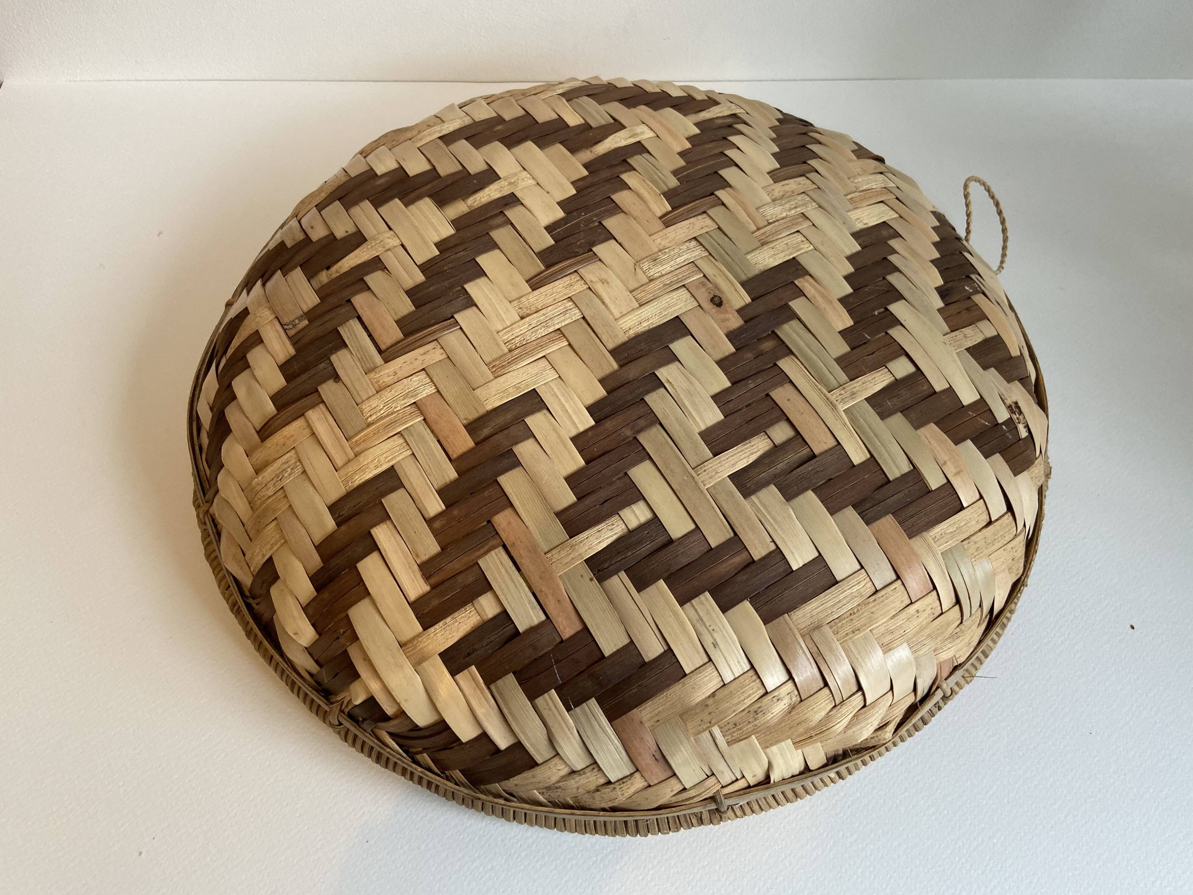 Two-coloured braided wicker basket