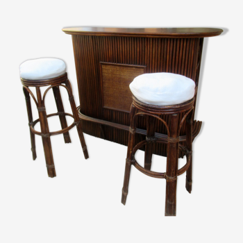 Rattan bar with its stools