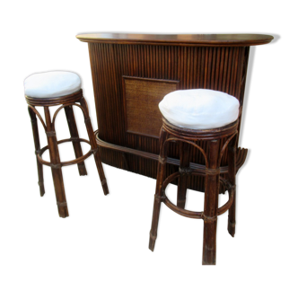 Rattan bar with its stools