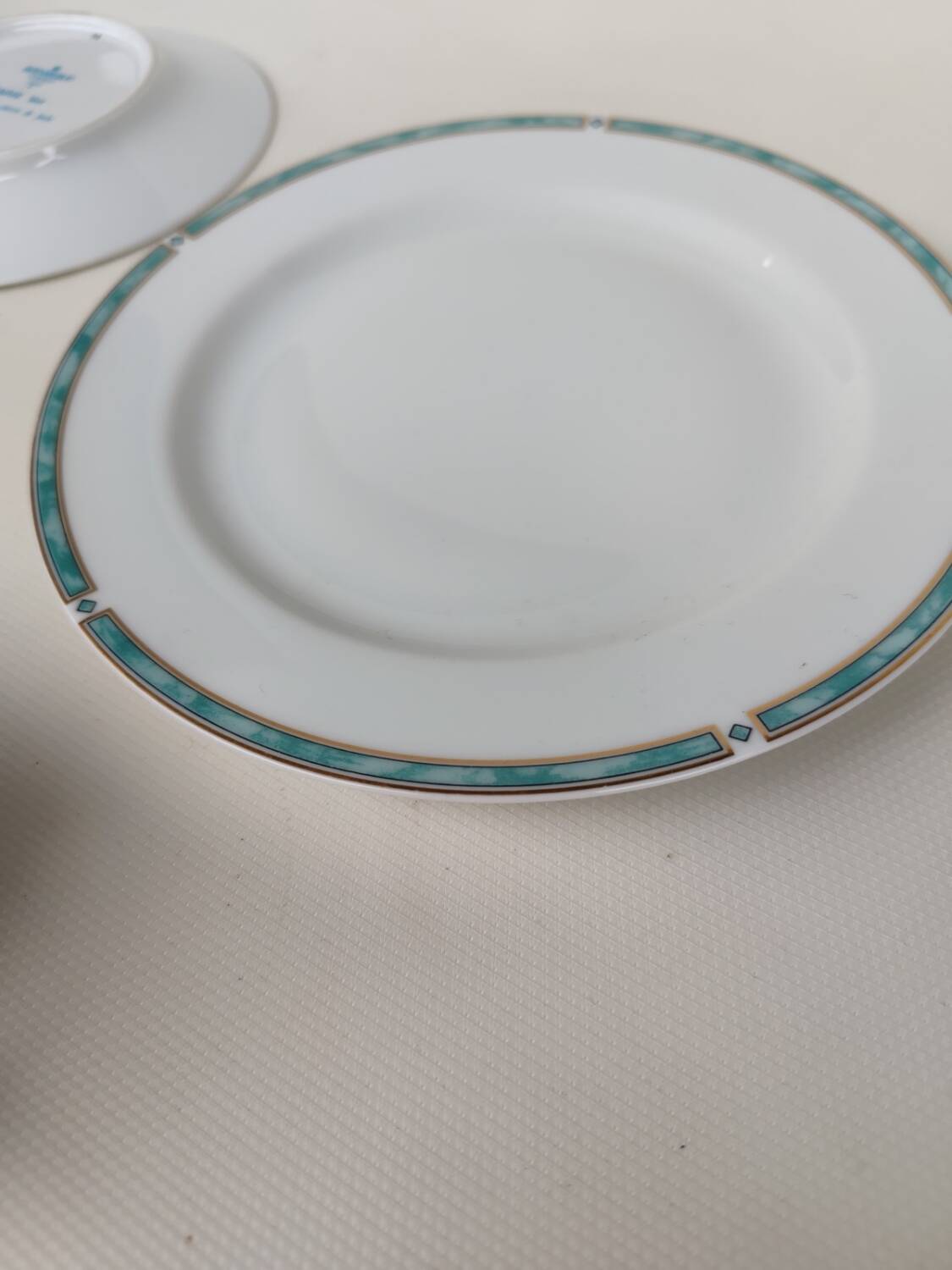 Three-piece Limoges porcelain set. By Bernardaud.