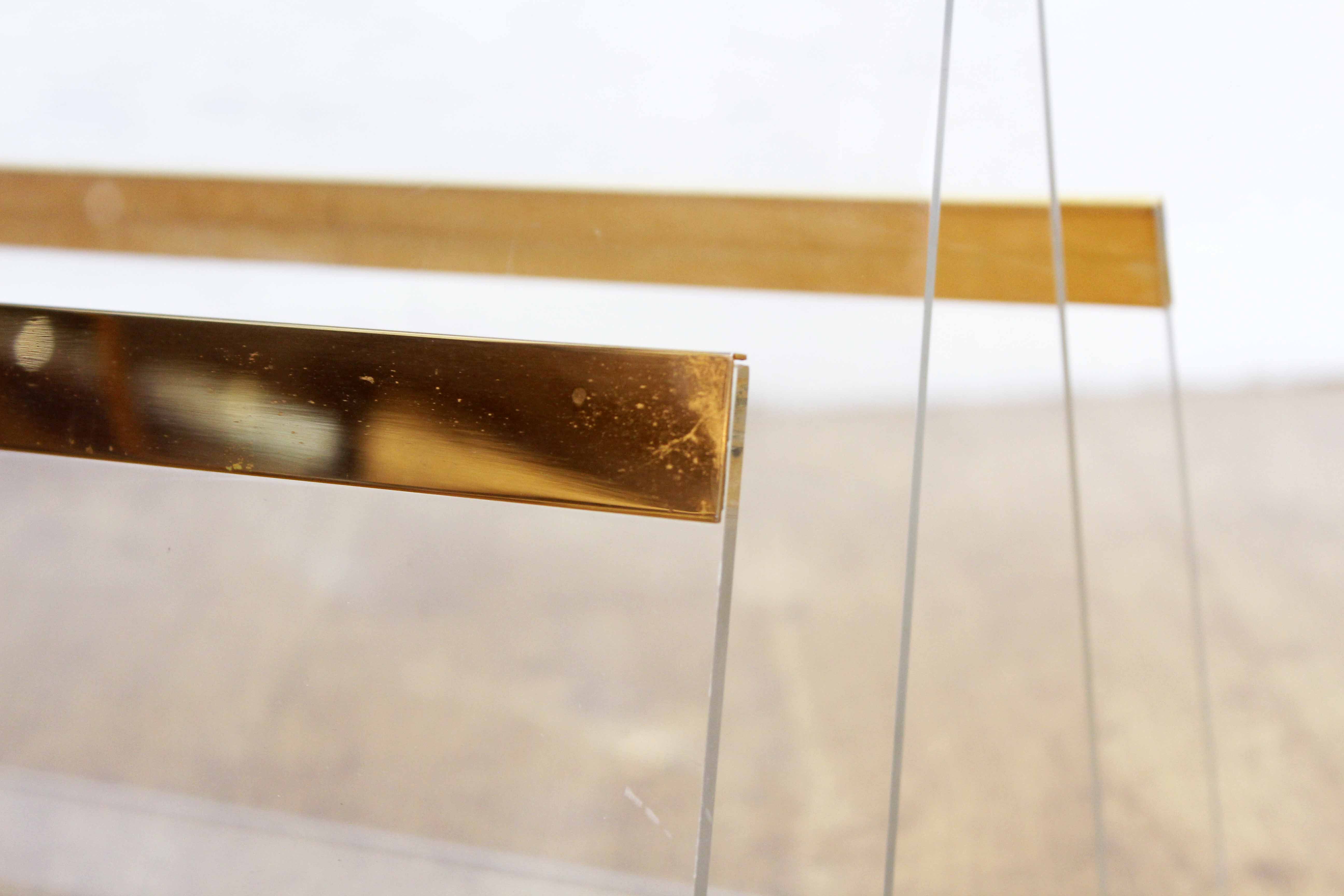 Plexiglas and brass magazine holder