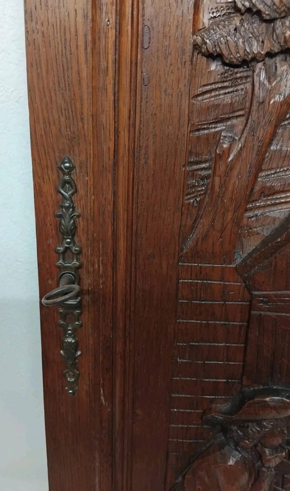 Old carved oak wooden door