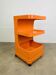 Desserte Flair pour Prisunic en plastique orange, seventies
