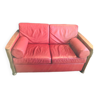 Red leather sofa.