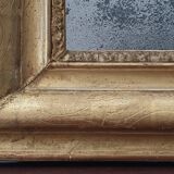 Old gilded mirror and old mercury glass - wall mirror with gold leaf