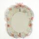 Italian mid-century wall mirror with a Murano glass frame and blossoms
