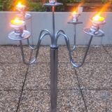 Standing candlestick in stainless steel metal with 5 movable branches, with smooth ring for 4 cm candles.