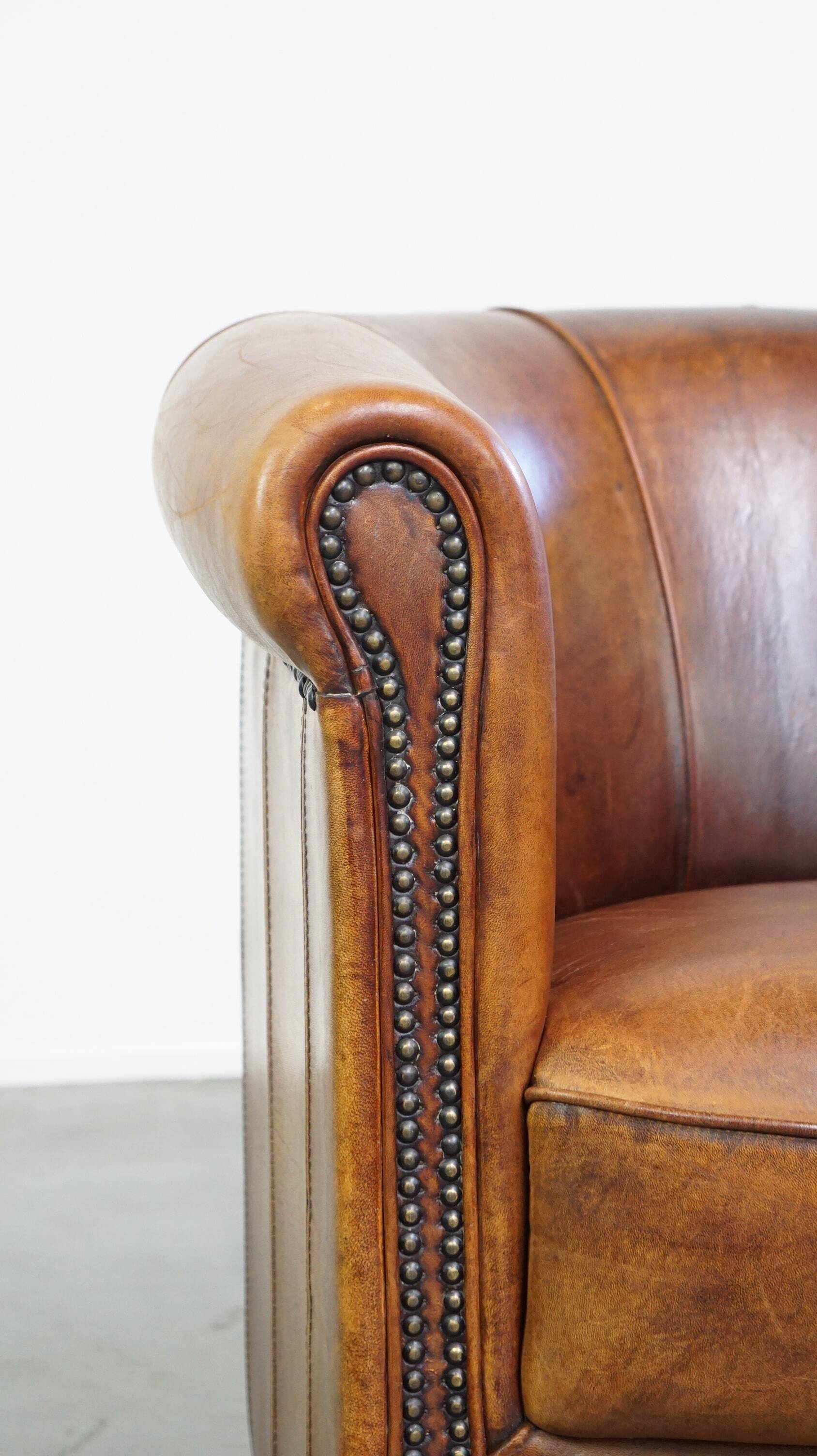 Brown leather club chair