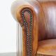 Brown leather club chair