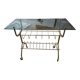 Green and brass trolley on wheels