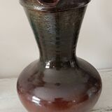 Large ceramic pitcher in brown monochrome.