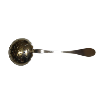 Silver spoon to sprinkle sugar on strawberries