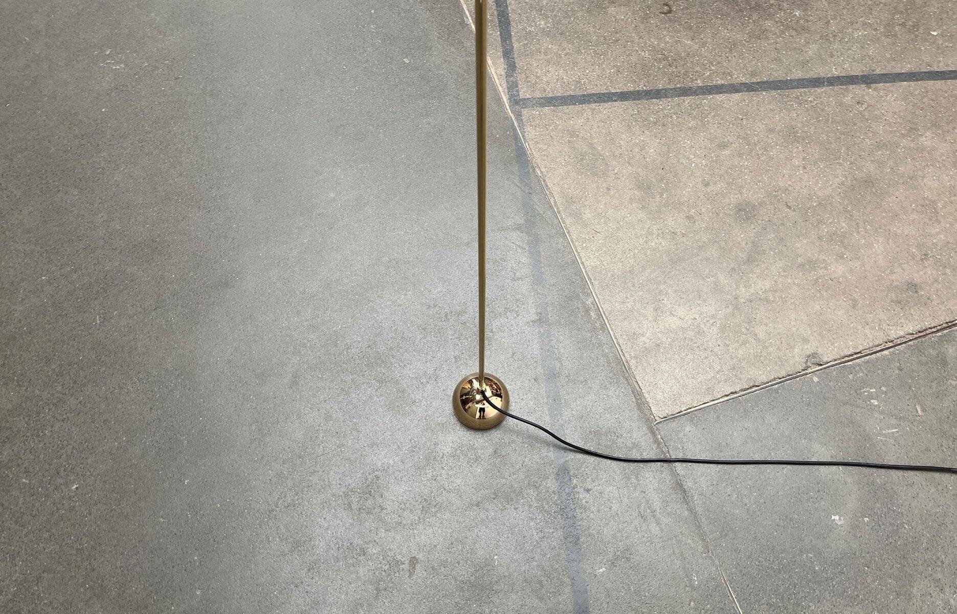 Minimalist brass floor lamp from the mid-century by Dieter Schulz for Wohnbedarf Ag, 1950s.
