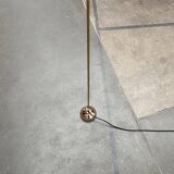 Minimalist brass floor lamp from the mid-century by Dieter Schulz for Wohnbedarf Ag, 1950s.