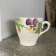 10 slipware cups, pansies