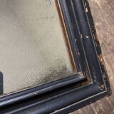 19th century blackened mirror with pitted glass 34cm x 40cm