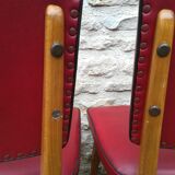 Chairs in red skaï