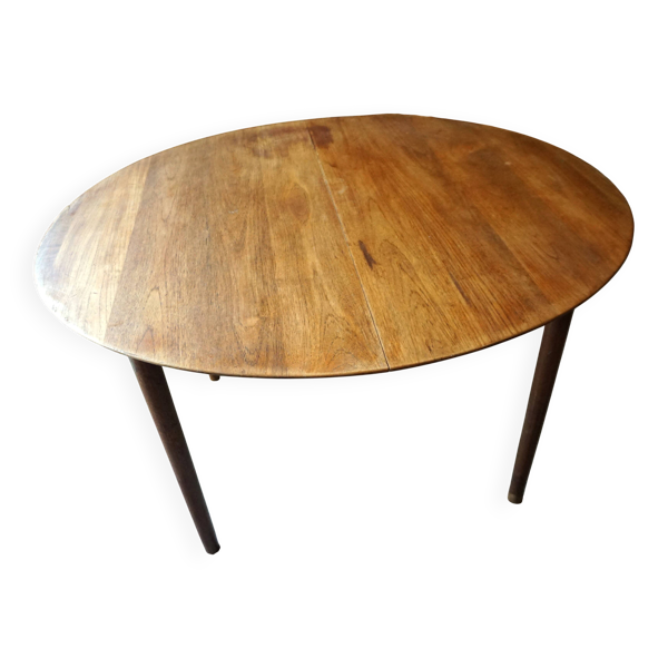 Elégante table ronde en teck avec rallonge