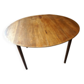 Elégante table ronde en teck avec rallonge