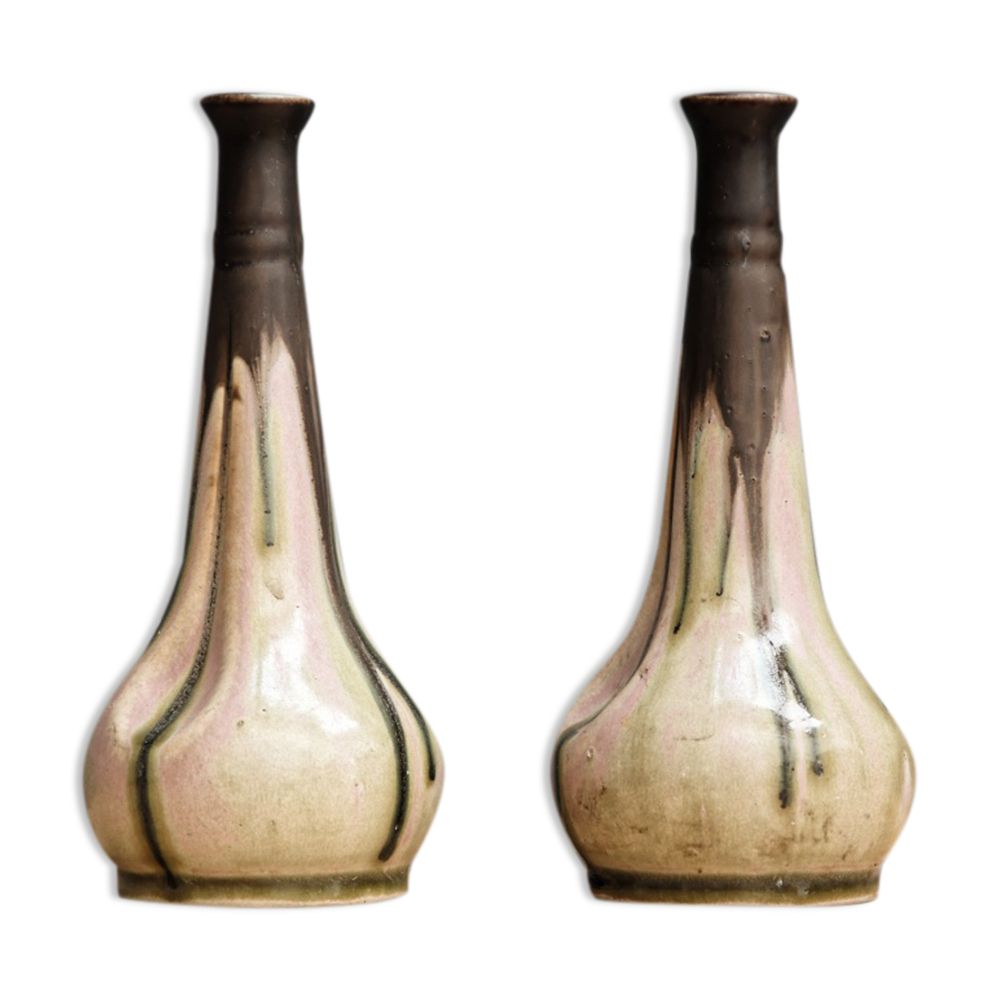 Pair of glazed sizzlings, signed