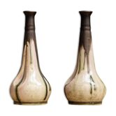 Pair of glazed sizzlings, signed
