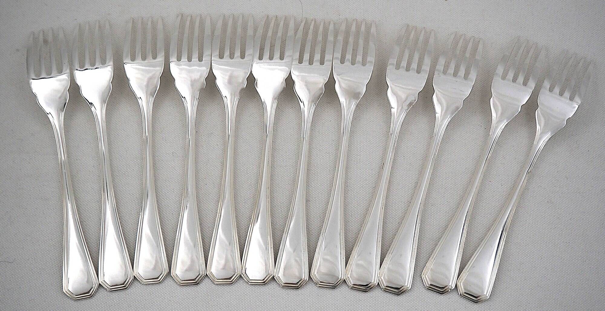 Christofle America, Art Deco 12 fish cutlery, 24 pieces silver-plated metal.