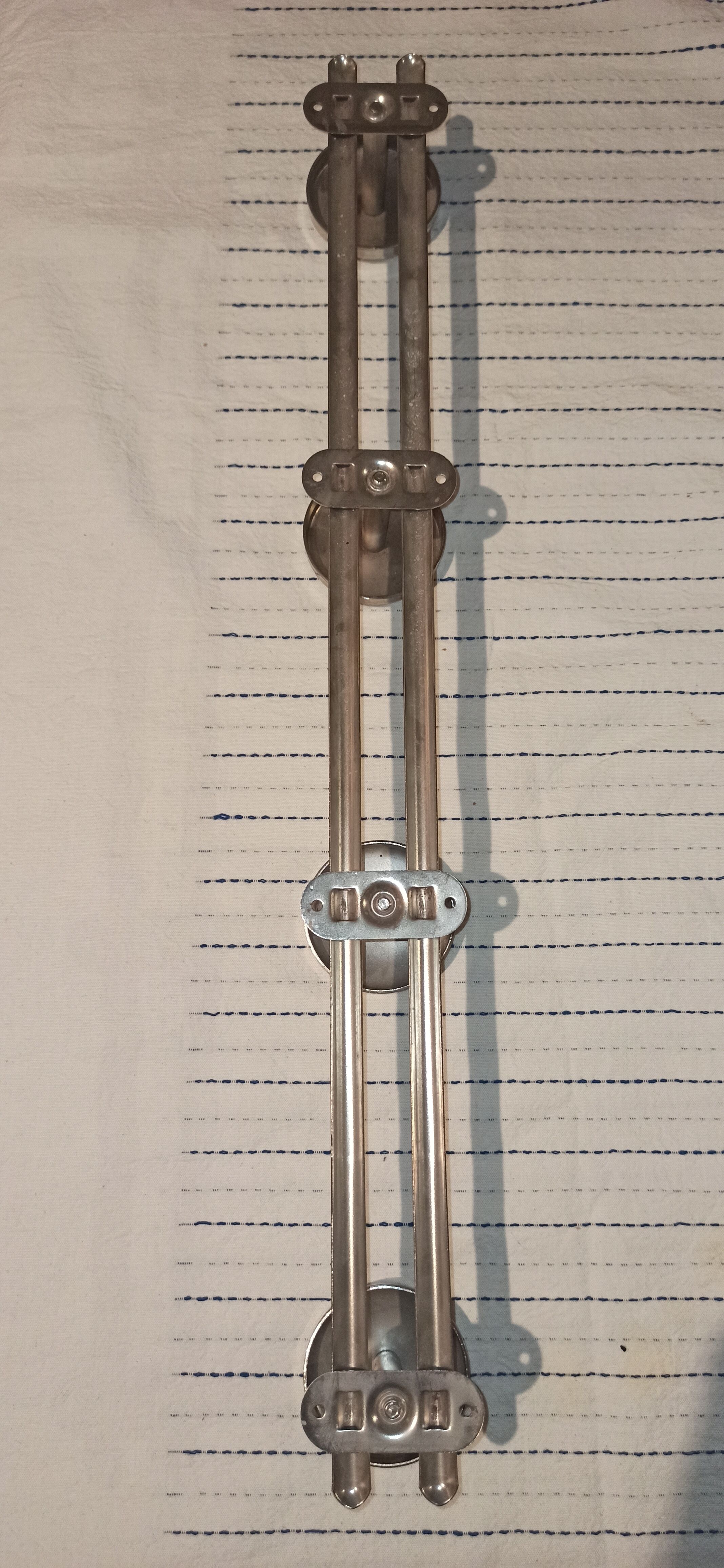 Metal wall coat rack