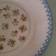 Assiette creuse en faïence, début XXème