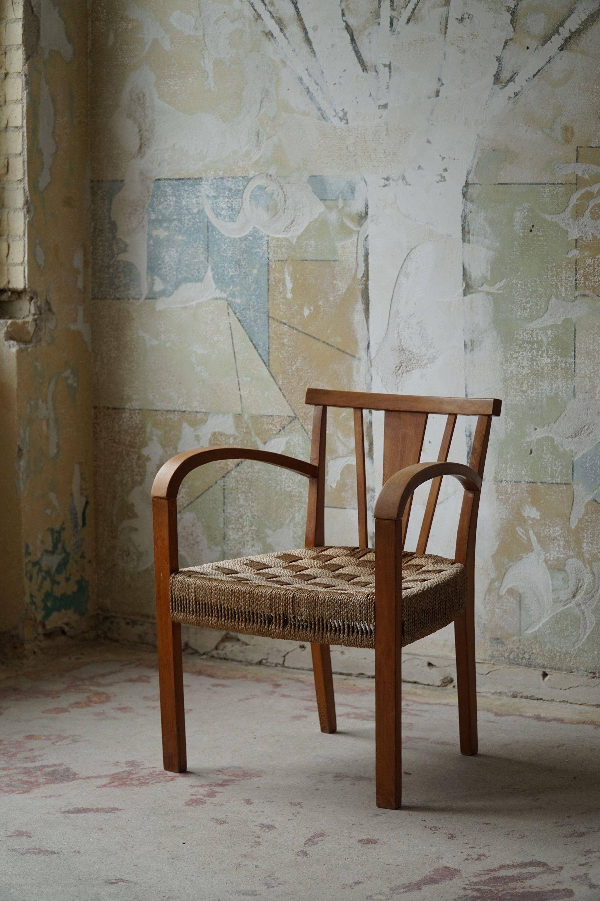 Modern Danish lounge chair in beech and paper cord, in the style of Frits Schlegel.