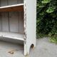Old white shelf in weathered pine