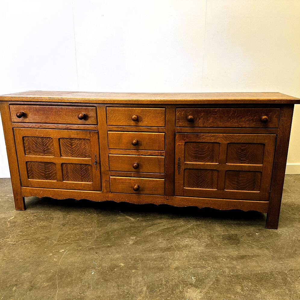Vintage french oak sideboard with wavy details, ca. 1950s