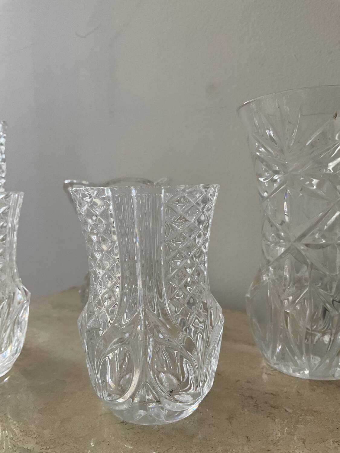 Series of 6 miniature vases in chiseled glass