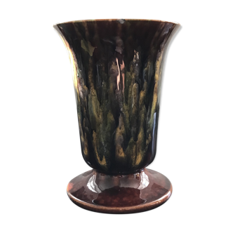 Vase hides flamed earthenware pot