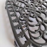 Large vintage black cast iron trivet